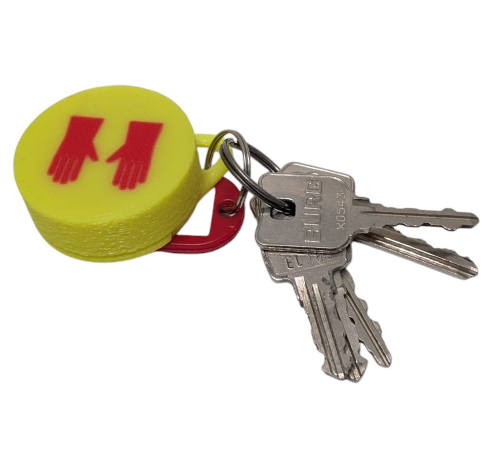 Handschuhanhänger neogelb mit rotem Handschuhlogo und beispielhaftem Schlüssel